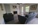 Comfortable living room featuring a fireplace and neutral decor at 340 Teal Ct, Roswell, GA 30076