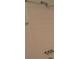 Tiled shower with brushed metal hardware at 340 Teal Ct, Roswell, GA 30076