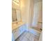Bathroom featuring single vanity, toilet, and shower/tub combo at 1557 Springleaf Se Ct, Smyrna, GA 30080