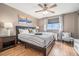 Comfortable bedroom with a queen-sized bed, stylish linens, and a large window offering a scenic view at 215 Piedmont Ne Ave # 2003, Atlanta, GA 30308