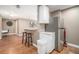 Efficient kitchen area featuring modern stainless steel refrigerator and hardwood floors at 215 Piedmont Ne Ave # 2003, Atlanta, GA 30308
