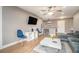 Open-concept living room with stylish furnishings and a breakfast bar for casual dining at 215 Piedmont Ne Ave # 2003, Atlanta, GA 30308