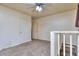 Upstairs bedroom features carpet and neutral paint at 1245 Shore Dr, Atlanta, GA 30311
