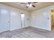 Neutrally decorated bedroom with carpet and overhead fan at 1245 Shore Dr, Atlanta, GA 30311
