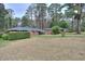 Well-maintained red brick exterior with lush greenery and spacious lawn at 1245 Shore Dr, Atlanta, GA 30311
