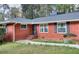 Close up of a well maintained brick home, showcasing an inviting entrance at 1245 Shore Dr, Atlanta, GA 30311