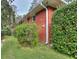 Charming brick house featuring lush, green landscaping and well-maintained lawn at 1245 Shore Dr, Atlanta, GA 30311