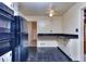 Eat-in kitchen with black appliances and ample counter space at 1245 Shore Dr, Atlanta, GA 30311