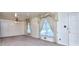 An expansive living area with two windows and plush carpeting at 1245 Shore Dr, Atlanta, GA 30311