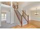 A view from the foyer with hardwood floors and stairs leading upstairs at 540 Basil Sw Ct, Marietta, GA 30064