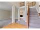 A view from the foyer with carpeted floors and stairs leading upstairs at 540 Basil Sw Ct, Marietta, GA 30064