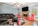 Inviting living room features a fireplace, plush seating, and modern decor at 95 Hawthorn Ln, Covington, GA 30014