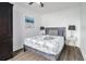 Cozy bedroom showcasing a comfortable bed, modern lamps, and a serene ambiance at 215 Piedmont Ne Ave # 708, Atlanta, GA 30308