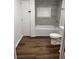 Cozy bathroom featuring a tub and shower combo, updated vanity and light-colored walls at 2523 Hood Nw Ave, Atlanta, GA 30318
