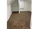 Empty bedroom featuring a ceiling fan and plush carpet at 2523 Hood Nw Ave, Atlanta, GA 30318