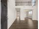 Bright, modern foyer with dark wood flooring, high ceilings, and open view to the living spaces at 3780 Near Star Ln, Cumming, GA 30028
