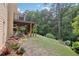Lush backyard with patio, deck and beautiful landscaping with garden at 4062 Vinings Mill Se Trl, Smyrna, GA 30080