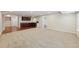 Spacious finished basement with wet bar, recessed lighting, and neutral carpet and paint at 4062 Vinings Mill Se Trl, Smyrna, GA 30080
