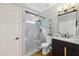 Updated bathroom features a glass-enclosed shower with stylish tile work, modern vanity, and fixtures at 4062 Vinings Mill Se Trl, Smyrna, GA 30080