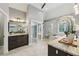 Bright bathroom featuring double vanities, a luxurious soaking tub, and a separate glass-enclosed shower at 4062 Vinings Mill Se Trl, Smyrna, GA 30080