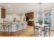 Well-equipped kitchen with granite countertops, stainless steel appliances, and breakfast bar seating at 4062 Vinings Mill Se Trl, Smyrna, GA 30080