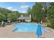 Inviting community pool with a variety of seating and lounging options at 4062 Vinings Mill Se Trl, Smyrna, GA 30080