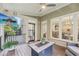 Relaxing screened porch adjacent to home offers outdoor living and dining space at 4062 Vinings Mill Se Trl, Smyrna, GA 30080