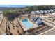 Aerial shot of community swimming pool featuring a pergola, recreation area and a manicured lawn at 784 Keystone Dr, Woodstock, GA 30188