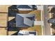 Top-down view showcasing a house's roof, driveway, and surrounding yard, emphasizing its layout at 784 Keystone Dr, Woodstock, GA 30188