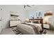 Comfortable bedroom featuring a plush bed, modern decor, soft lighting, and a serene ambiance at 784 Keystone Dr, Woodstock, GA 30188