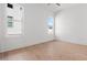 Bright bedroom with hardwood floors and natural light at 784 Keystone Dr, Woodstock, GA 30188