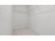 Walk-in closet with carpeted floor and wire shelving at 784 Keystone Dr, Woodstock, GA 30188