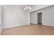 Open dining room featuring hardwood flooring and modern lighting at 784 Keystone Dr, Woodstock, GA 30188