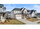 Beautiful home featuring a brick facade, covered entryway, and a well-manicured lawn in a friendly neighborhood at 784 Keystone Dr, Woodstock, GA 30188