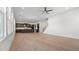 Open concept living area featuring hardwood floors, recessed lighting, and view of modern kitchen at 784 Keystone Dr, Woodstock, GA 30188