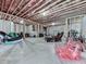 Spacious unfinished basement with concrete floor, exposed ceiling and waiting for your imagination at 1170 Upper Sweetwater Se Trl, White, GA 30184