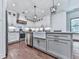 Spacious kitchen featuring a large island, stainless steel appliances, and custom cabinetry at 1170 Upper Sweetwater Se Trl, White, GA 30184