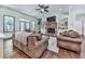 Spacious living room with hardwood floors, fireplace, built-ins, and comfortable seating at 1170 Upper Sweetwater Se Trl, White, GA 30184
