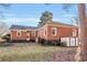 Charming brick home with a spacious backyard and mature trees at 948 Sycamore Dr, Decatur, GA 30030