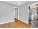 Dining area with hardwood floors and view into the kitchen at 948 Sycamore Dr, Decatur, GA 30030