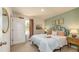 Comfortable bedroom with neutral tones, a decorative headboard, and plenty of natural light at 2641 Cacao Sq, Acworth, GA 30101