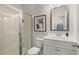 Clean bathroom featuring shower and tub, vanity, and modern fixtures for relaxation at 3790 Near Star Ln, Cumming, GA 30028