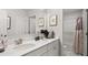 Modern bathroom featuring double vanity sinks with ample counter space and a separate shower area at 3790 Near Star Ln, Cumming, GA 30028