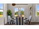 Cozy breakfast nook with bright windows and views of the outdoors, adjacent to the kitchen at 3790 Near Star Ln, Cumming, GA 30028