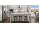 Modern kitchen with stainless steel appliances, a large island, and a breakfast nook at 3790 Near Star Ln, Cumming, GA 30028