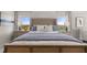 Relaxing main bedroom featuring a luxurious upholstered headboard and ample natural light at 3790 Near Star Ln, Cumming, GA 30028