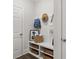 Functional mudroom with built-in storage for organizing coats, shoes, and accessories at 3790 Near Star Ln, Cumming, GA 30028