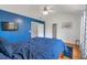 Spacious bedroom featuring vaulted ceiling, hardwood floors, and a ceiling fan at 4037 Hill Station Ct, Sugar Hill, GA 30518