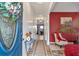 Inviting foyer with a decorative front door and interior featuring stylish decor and bright lighting at 4037 Hill Station Ct, Sugar Hill, GA 30518
