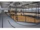 Spacious indoor gymnasium with basketball court, track, and ample natural light for various athletic activities at 4037 Hill Station Ct, Sugar Hill, GA 30518
